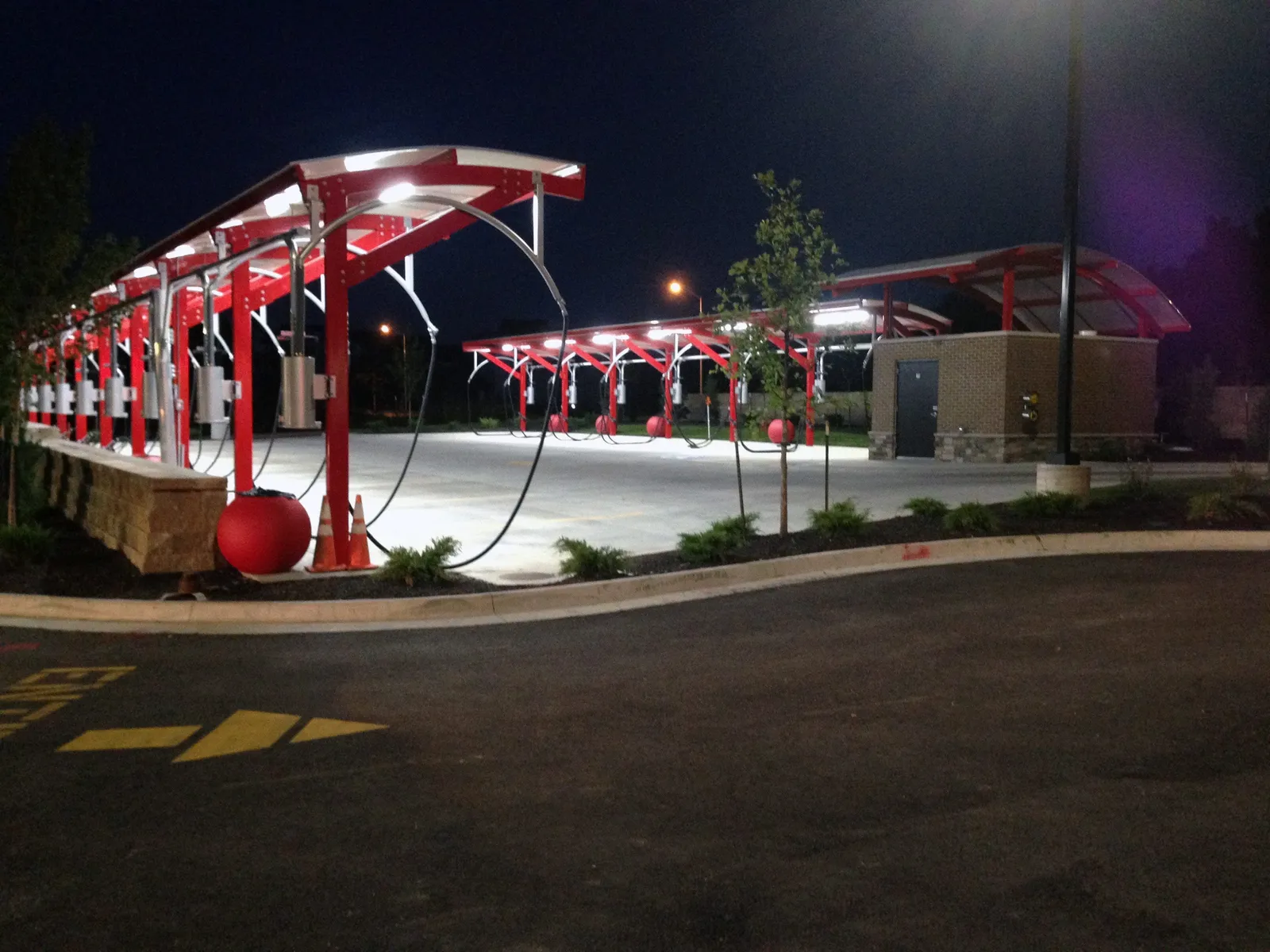Illuminated Eurovac vacuum canopy at night