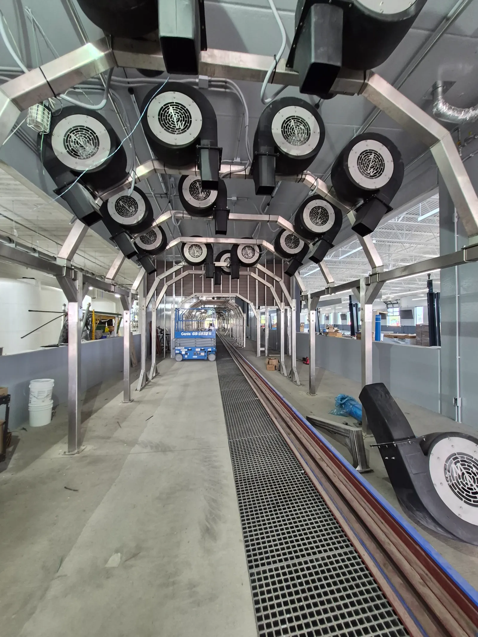 Wash equipment being installed along the conveyor inside the tunnel