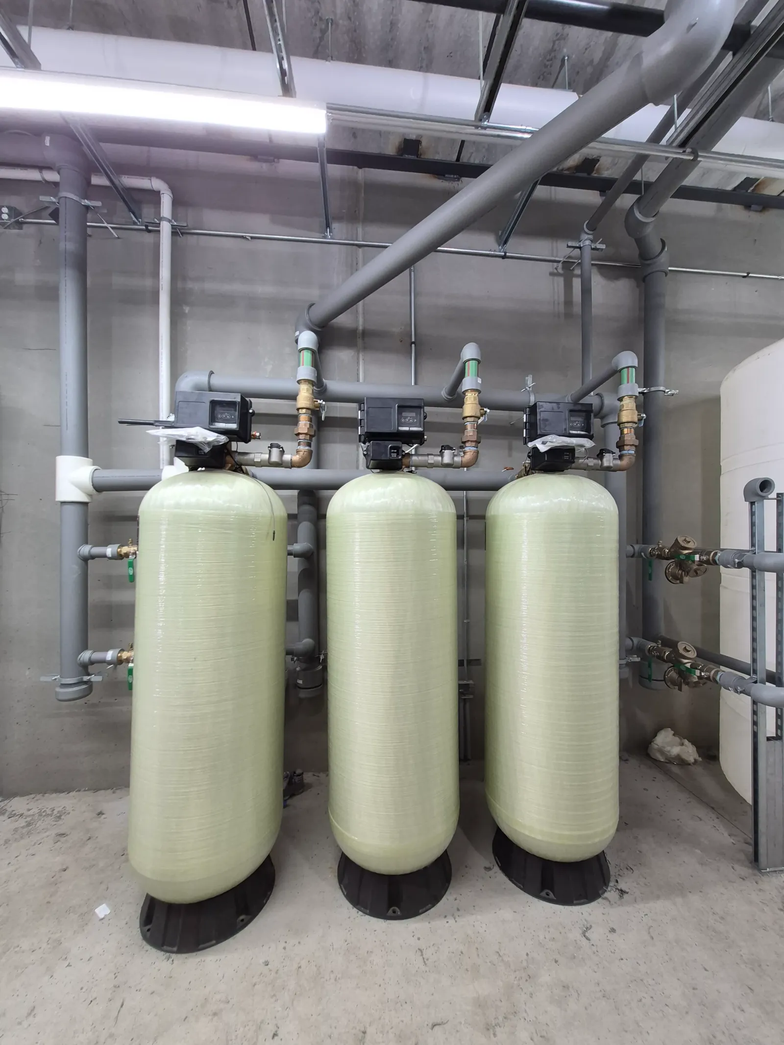 Water softener tanks in the equipment room